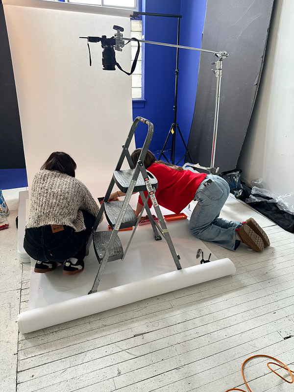 a film crew styles a photoshoot at le loft a chicago production venue