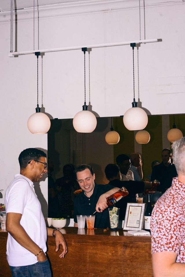 a bar tender pours a beverage at a byob wedding venue